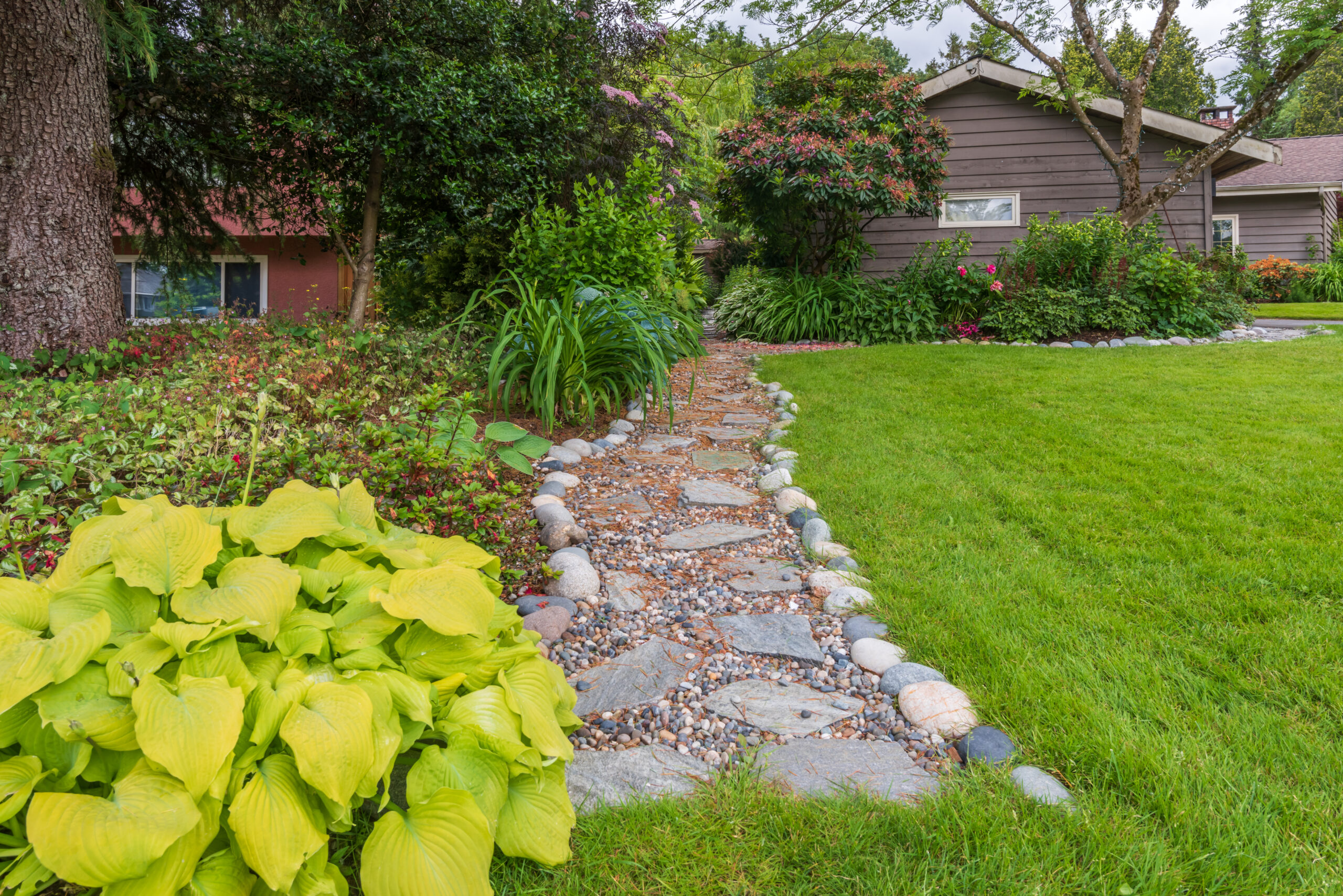 stone-path-through-garden-leading-to-house-2026-09-24-23-38-56-utc